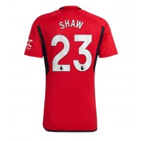 Camisa de time de futebol Manchester United Luke Shaw #23 Replicas 1º Equipamento 2023-24 Manga Curta
